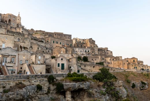 Matera, Italy - September 17, 2019: View of the Sassi di Matera a historic district in the city of Matera, well-known for their ancient cave dwellings. Basilicata. Italy