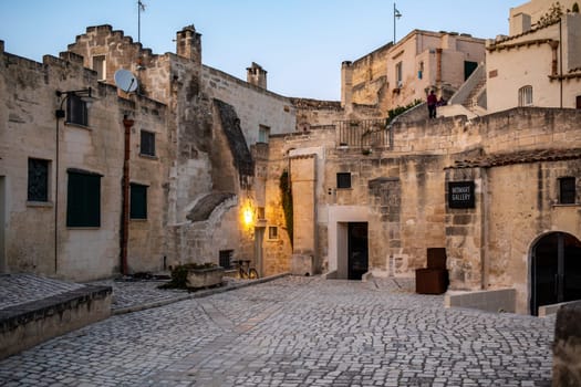 Matera, Italy - September 20, 2019: Houses in the Sassi di Matera a historic district in the city of Matera, well-known for their ancient cave dwellings. Basilicata. Italy