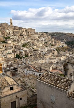 View of the Sassi di Matera a historic district in the city of Matera, well-known for their ancient cave dwellings. Basilicata. Italy