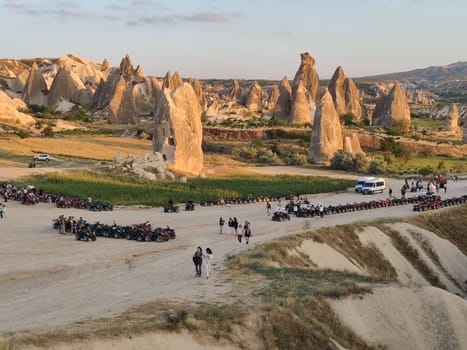 Quads and group of tourists near Cappadocia Fairy Chimneys