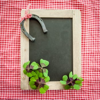 Rustic table with glue clovers clover and horseshoe