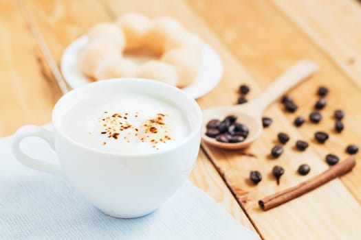 closeup coffee foam and bread favorite beverage in bright day