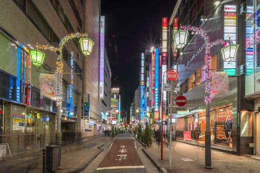 ikebukuro, japan - december 31 2019: Night view of the Sunshine Street at the east exit of Ikebukuro train station with restaurants and shops illuminated for christmas and new year celebrations.