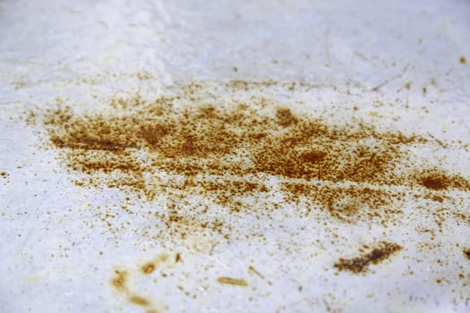 Detail of old metal wall damaged and rusty by the passage of time