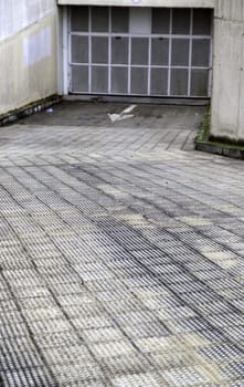 Detail of the entrance slope to a garage in the city