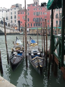 Venice, Italy, 02.22.2007. Venetian streets with graceful building facades. Grand Canal. Along the canal are Gothic and Renaissance palaces. Sights of Italy. Tourism business