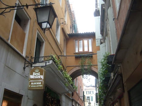 Venice, Italy, July 22, 2007. Venetian streets with graceful building facades. Grand Canal. Along the canal are Gothic and Renaissance palaces. Sights of Italy. Tourism business