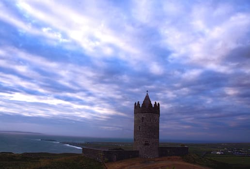 Amazing landscape of Doonagore castle and irish coastline  at Doolin, County Clare, Ireland