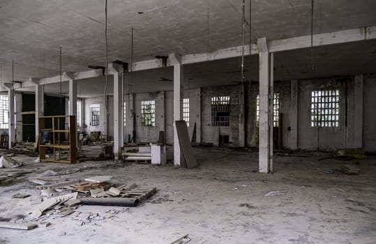 Detail of the interior of an old factory in ruins and abandonment