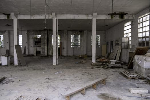 Detail of the interior of an old factory in ruins and abandonment
