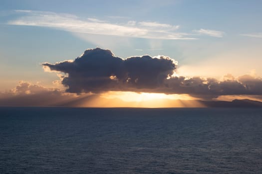 View from Procida island - magic sunrise with dramatic clouds.