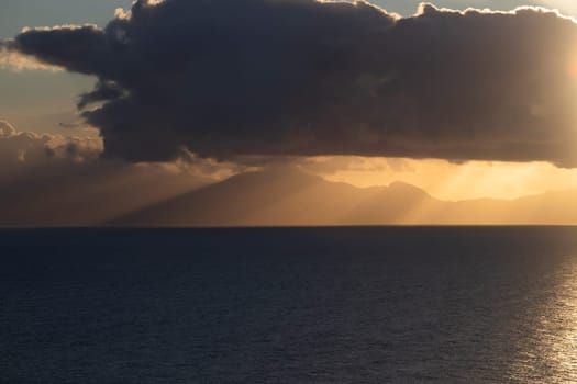 View from Procida island - magic sunrise with dramatic clouds.