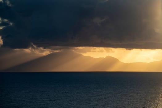 View from Procida island - magic sunrise with dramatic clouds.