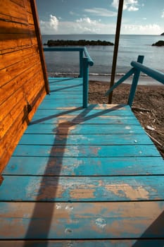 Colorful wooden hut on Chiaiai beach, Procida Island, Italy.