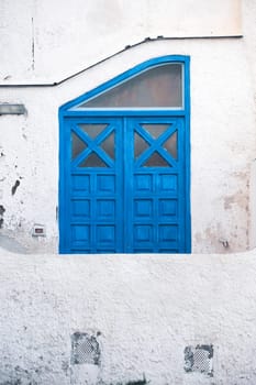 Procida island with colorful houses in small town street