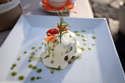 Italian dish, deep fried sliced eggplants baked with mozzarella, parmezan cheese and tomato sauce. Decorated with parsley.