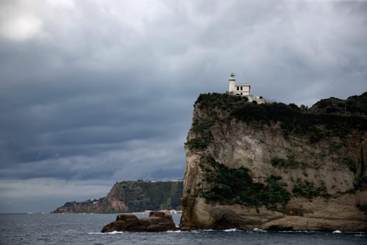 Capo Miseno and its lighthouse that marks the northwestern limit of the Gulf of Naples, Italy