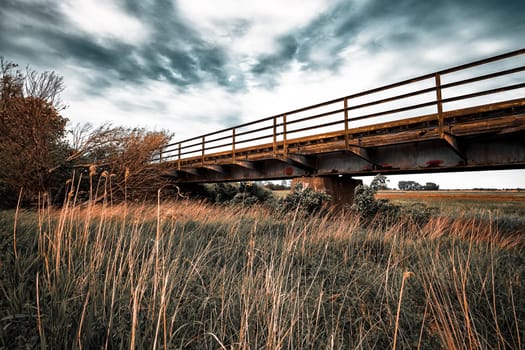 Former train line of the Darßbahn in Bresewitz, just before the Meiningen Bridge to the Fischland-Darß peninsula, Mecklenburg-West Pomerania, Germany