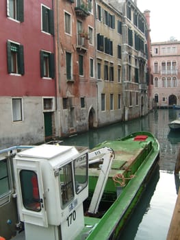 Venice, Italy, 02.22.2007. Venetian streets with graceful building facades. Grand Canal. Along the canal are Gothic and Renaissance palaces. Sights of Italy. Tourism business
