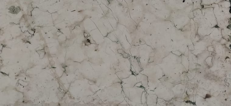 White marble natural pattern for background. marble surface. Sarajevo, Bosnia and Herzegovina, historic center. Close-up of the pavement near the mosque. Light marble or stone
