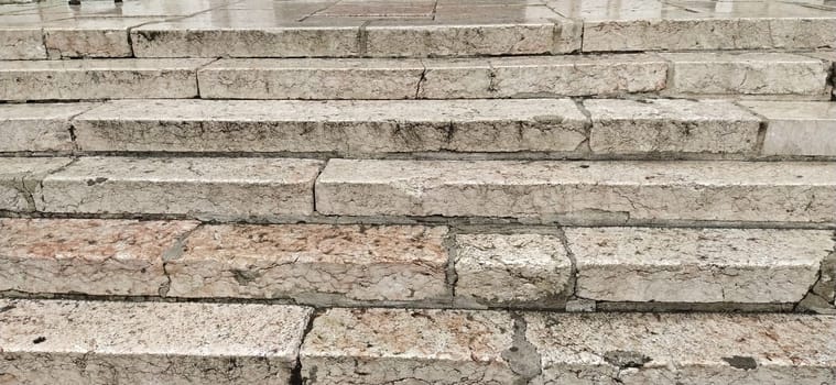 White marble natural pattern for background. marble surface. Sarajevo, Bosnia and Herzegovina, historic center. Close-up of the pavement near the mosque. Light marble or stone