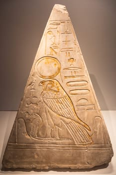Turin, Italy - March 2023: Egyptian Museum, Pyramidion with Horus falcon - 1279 BC