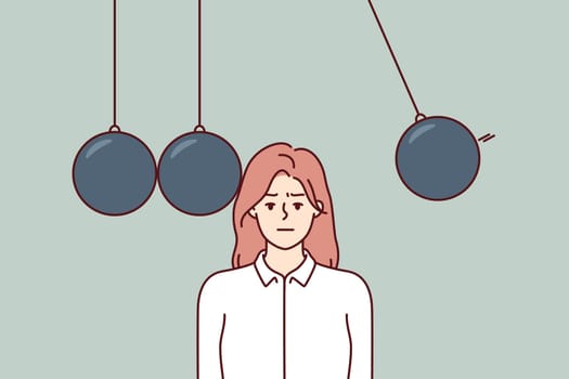 Woman employee corporation in danger standing among giant balls capable of causing harm. Girl office worker or businesswoman puts life in danger for sake career success and fulfillment of tasks boss