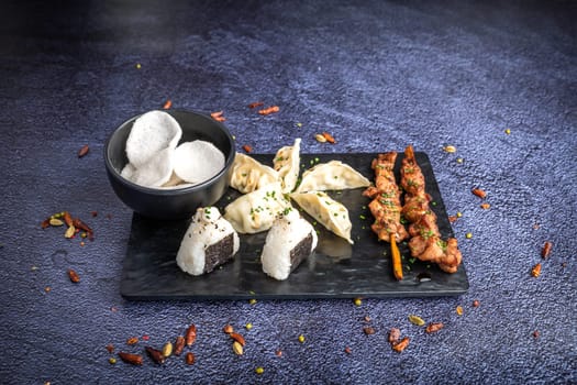 Chinese noodles, ravioli brochettes and  fresh sushis