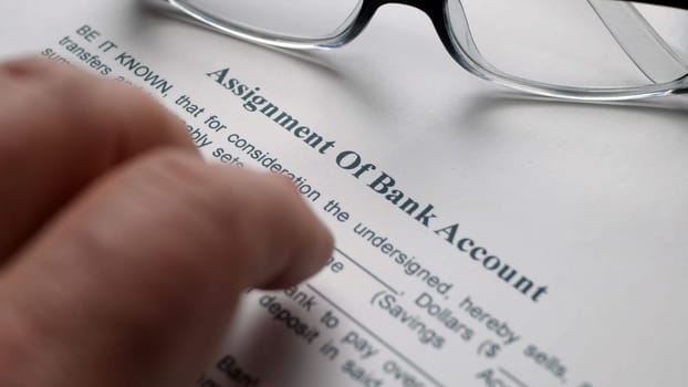 Finger tapping on assignment of bank account