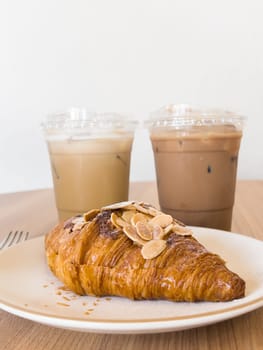Freshly baked croissants and iced coffee, stock photo