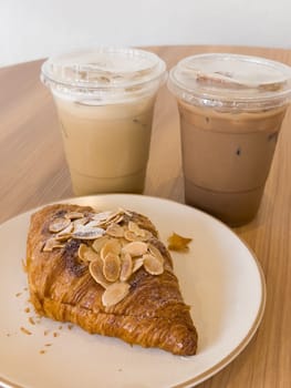 Freshly baked croissants and iced coffee, stock photo