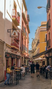 small street in the old town of Seville, Andalusia, Spain