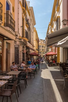 small street in the old town of Seville, Andalusia, Spain