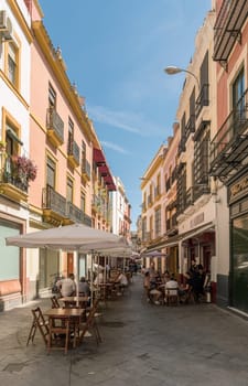 small street in the old town of Seville, Andalusia, Spain