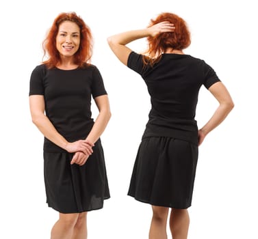 Photo of a young beautiful redhead woman with blank black shirt. Isolated over white background and ready for your design or artwork.
