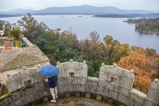 Granadilla village. Viisitor enjoying an aerial view from castle. Extremadura, Caceres, Spain