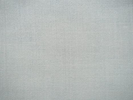 Texture canvas fabric as background. Gray sackcloth. Grey linen scrim.