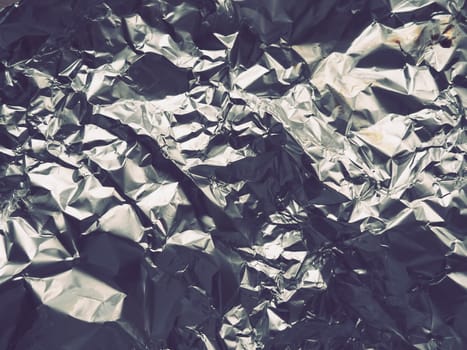 foil close-up. Aluminum silver crumpled foil. Abstract metallic background. Foil for baking food. Background.