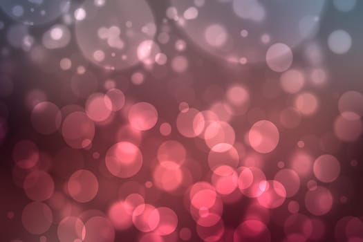 A festive abstract gradient orange pink red background texture with glitter defocused sparkle bokeh circles . Card concept for Happy New Year, party invitation, valentine or other holidays.