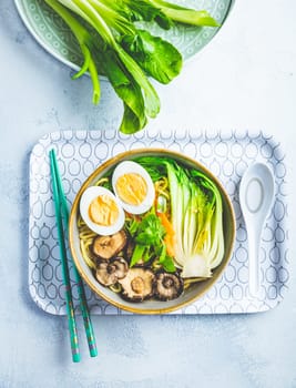Ramen soup with shiitake mushrooms, vegetables, noodles and egg