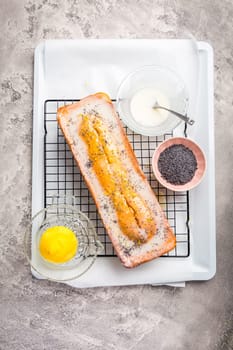 Lemon poppy cake with sugar sweet icing, lemon pound cake loaf