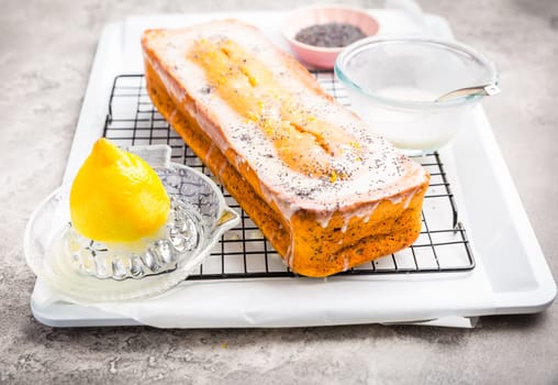 Lemon poppy cake with sugar sweet icing, lemon pound cake loaf