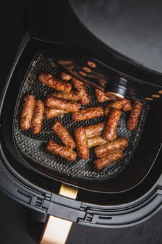 Traditional south european skinless sausages cevapcici, cevapi, Balkan minced meat kebab grilled in airfryer