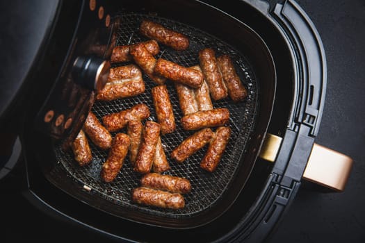 Traditional south european skinless sausages cevapcici, cevapi, Balkan minced meat kebab grilled in airfryer