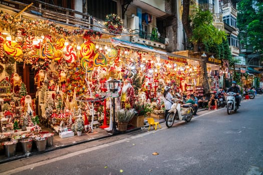 Hanoi, Vietnam, November 14, 2022: Brightly lit display of a Christmas store in French Quarter in Hanoi, Vietnam