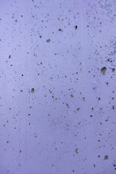 Detail of textured blue painted wall, outdoor decoration