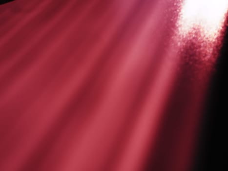 Diagonal rays of light on a red, pink or burgundy background. Blurred abstract background light effect and leaks. Side surface illumination. Parallel and asymmetric lines, stripes of light at an angle