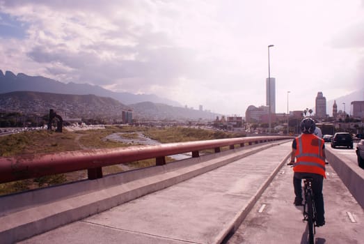 Photograph of an urban cyclist on a cycling track