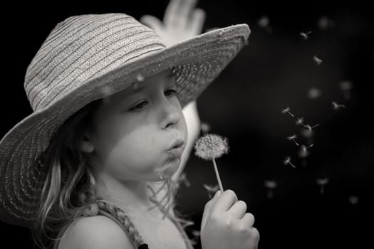 Portrait of a blonde girl with hat