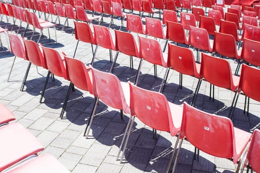 red chair lined. Image of a tens of red chairs lined